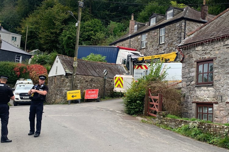 The power has been turned off ahead of the removal of the haulage truck stuck down a narrow lane in Forder. (Picture: Sarah Martin)