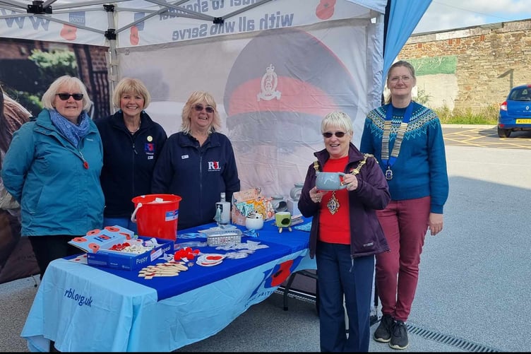 LIONS president Lisa Ince and mayor Christina Whitty next to the Liskeard Royal British Legion stall