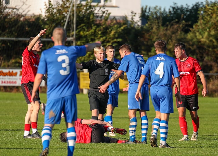Dobwalls appeal for a free-kick during Saturday's Walter C Parson SWPL League Cup clash with Honiton Town at Lantoom Park, a tie which the visitors won 3-1. Picture: Colin Hilton