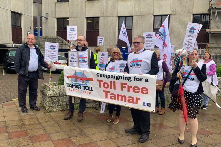 Members of Tamar Toll Action Group have gathered outside the Copthorne Hotel in Plymouth, the site of the inquiry