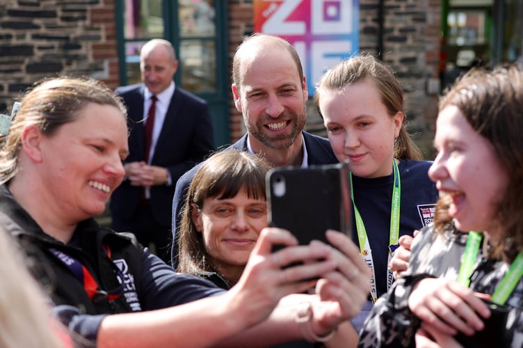The Duke of Cornwall was happy to take selfies with students who had lined up to see him at the end of his visit. (Picture: Andrew Parsons / Kensington Palace)