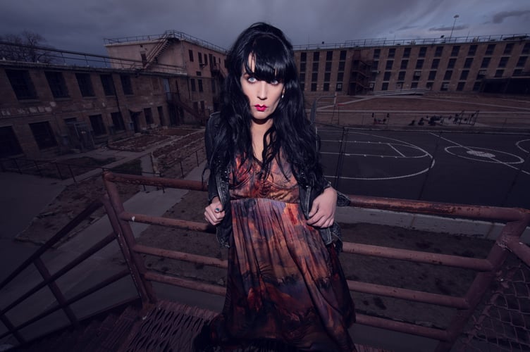 Brocarde at the Nevada State Penitentiary. A singer who married then divorced a ghost has revealed the most haunted places on Earth - including a prison in Cornwall and a Welsh pub. Spooky rock singer Brocarde famously wed then split from the spirit of a Victorian solider and is now a paranormal investigator. She is a horror influencer and has travelled the world documenting her stays in some of the worlds most haunted locations. Singer songwriter Brocarde of Oxford has now revealed where people should go this Halloween to attract a ghost. 