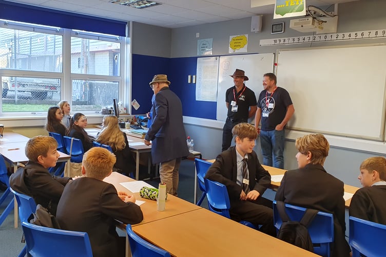 Gary Hooper, Tristan Netherton and Chris Netherton from The Stuns’ls Shanty Group, and Gideon Barrett and Chris Legg from Barrett’s Privateers, with Kevin Brinn from The Stowes. (Picture: Looe Community Academy)