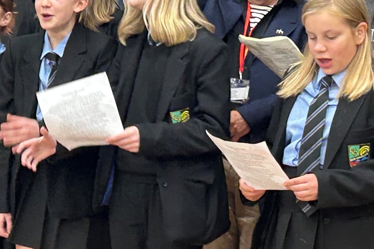 The students appreciated how music can be energetic - seen here performing what they had learnt in an assembly. (Looe Community Academy)