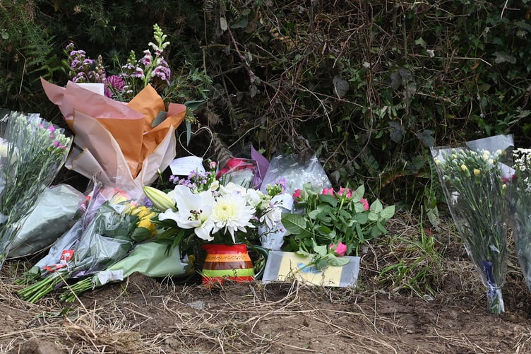 Flowers left at the scene of the incident in tribute to Fergus Lewis, who lost his life. (Picture: Adrian Jasper)