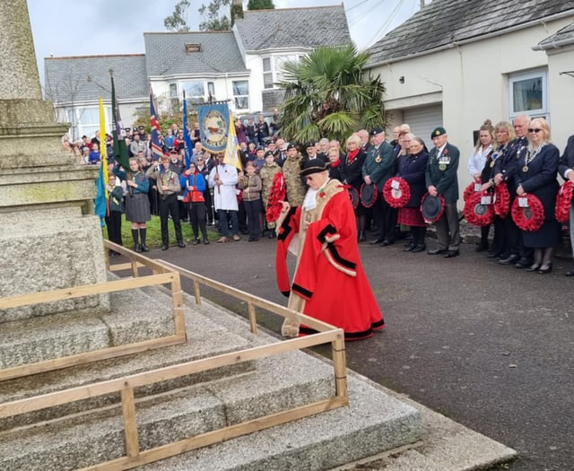 Town falls silent as wreaths laid to remember the fallen