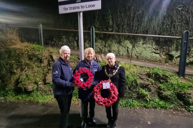 Liskeard Mayor Cllr Christina Whitty with volunteers from Looe RNLI awaiting the arrival of the GWR Poppies to Paddington service. (Picture: Terry Whitty)
