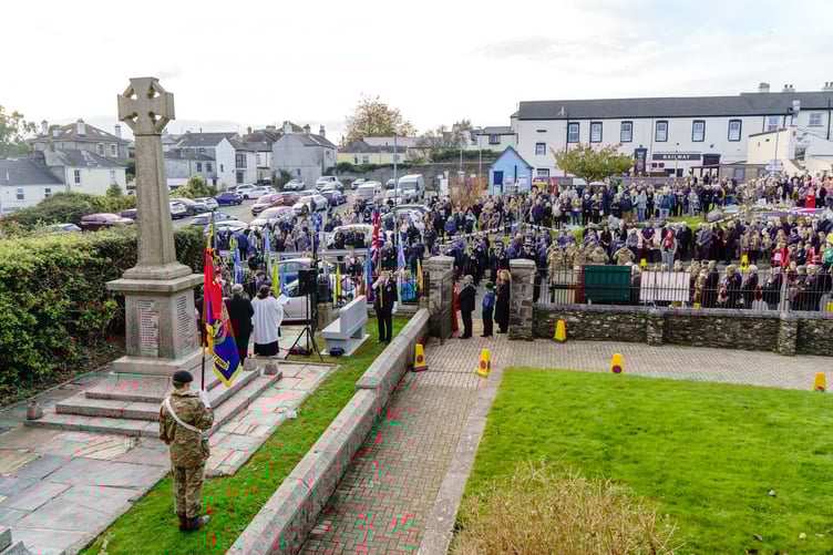 Wreaths were blessed and laid at the war memorial which now is home to two new memorial benches with the names of those missed from war monuments in the town. (Picture: STC/Mike Pitches)