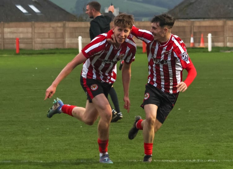 Saltash United duo Finley Wilkes (left) and Kieran O'Melia celebrates Wilkes' 53rd minute opener against Street at Kimberley Stadium on Saturday. Picture: Daz Hands Photography