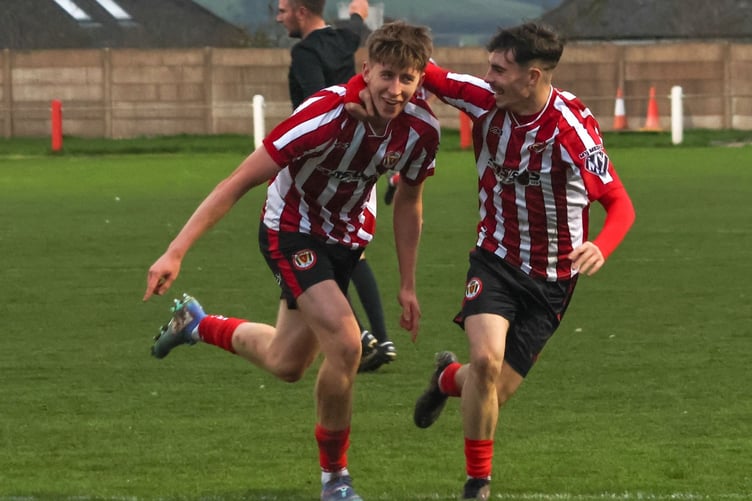 Saltash United duo Finley Wilkes (left) and Kieran O'Melia celebrates Wilkes' 53rd minute opener against Street at Kimberley Stadium on Saturday. Picture: Daz Hands Photography