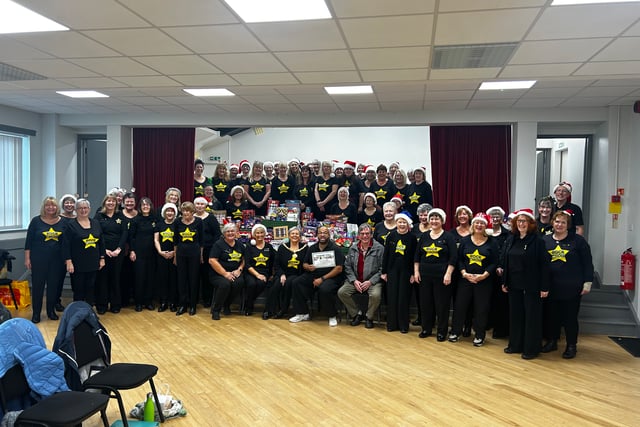 Rock choir's pitch perfect Christmas donations to Foodbank