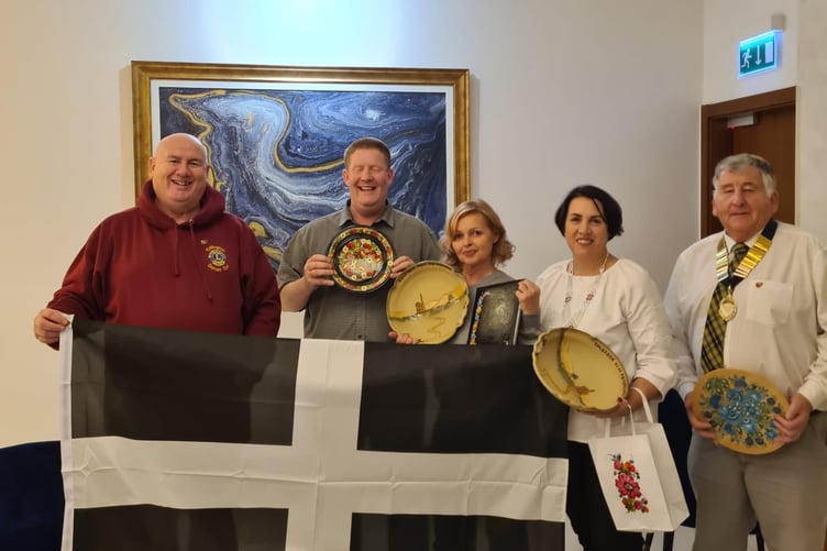 DARREN Tait of Cornwall and Devon Sending Love to Ukraine, Andrew Morton of the Tamar Valley Twinning Group, and chairman of Calstock Parish Council Jim Wakem, meeting with Lydia and Tatiana from Petrykivka, which has now formally twinned with Calstock Parish