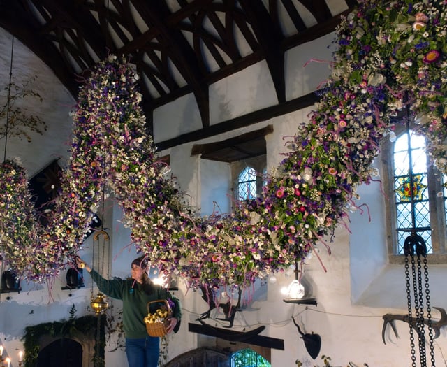 Last dried flower added to Christmas flower garland at Cotehele