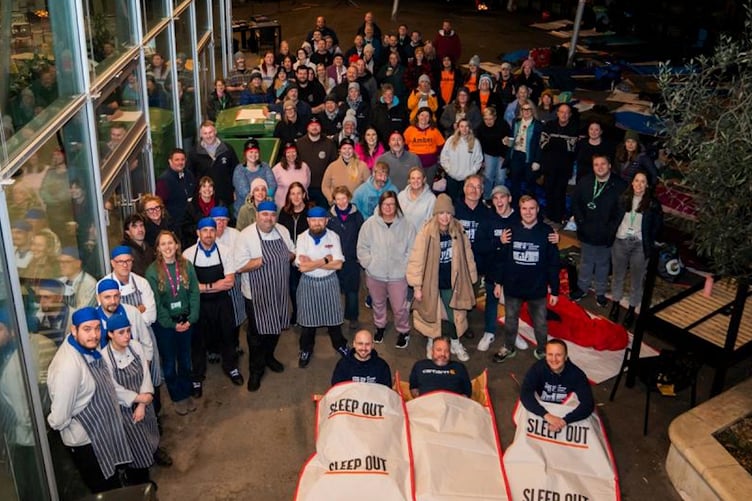 People bedded down outside the biomes at the Eden Project.