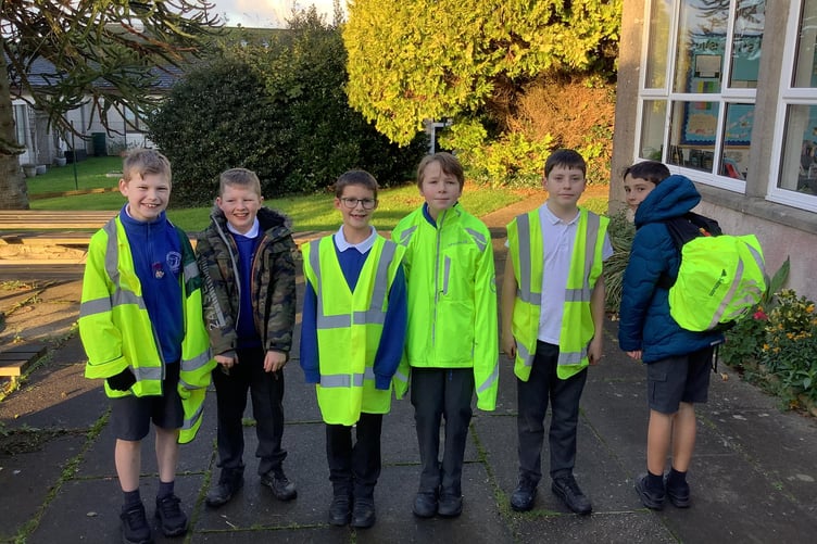 CHILDREN from Brunel School in Saltash got kitted out in high vis to raise awareness of road safety