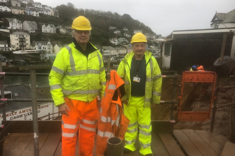 Looe Cornwall councillors Armand Toms (left) and Jim Candy visit the works being undertaken on the Polperro Road to shore up the wall. (Picture: Jim Candy)