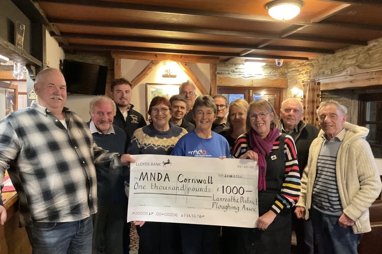 Lanreath and District Ploughing Association members presenting Alison Talling and Carole Aspden with a donation of £1000 for Motor Neurone Disease Association Cornwall for their valuable work. (Picture: Alison Talling)