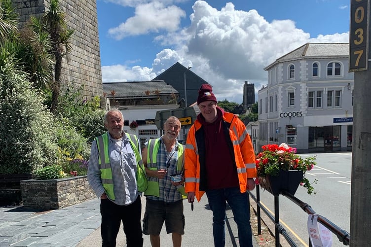 LISKEARD in Bloom's John Crumpton and John Hesketh out and about with Cllr Simon Cassidy earlier this year. The volunteer team work hard to keep the town's flowers and plants looking wonderful