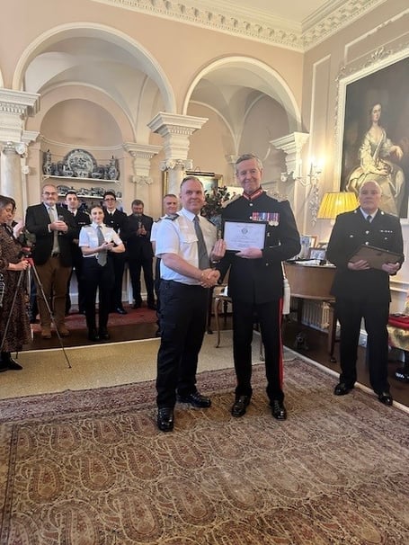 Liskeard Tri-Services Safety Officer, Kevin Goodreid, is presented with a special certificate of achievement by the Lord Lieutenant of Cornwall, Colonel Edward Bolitho