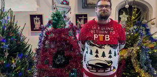 Medieval church transformed into sparkling Christmas tree wonderland