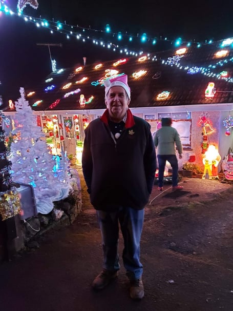 Martin Langdon outside of his festively decorated bungalow. (Picture: Brain Tumour Research)