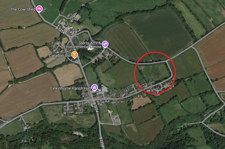 AERIAL map of Upton Cross, with the field for the proposed development within the red circle