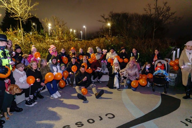After walking across the Tamar Bridge, the group held a one-minute silence to remember victims of gender-based violence before returning to Saltash. (Picture: Mike Pitches Photography)