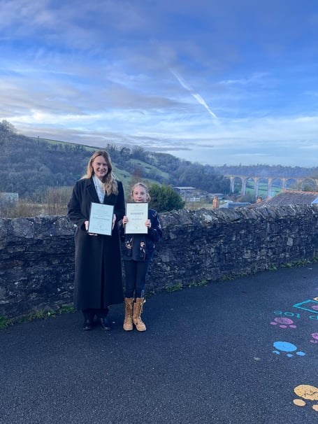 MP Anna Gelderd with the winner of her Christmas card competition Angelina