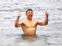 TV presenter braves the cold for Christmas Day dip in Cornish seas