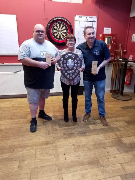 Winners James Chudleigh and Barrie Evans with their trophies following a successful charity fundraising night for the British Heart Foundation at the Old School in Pelynt