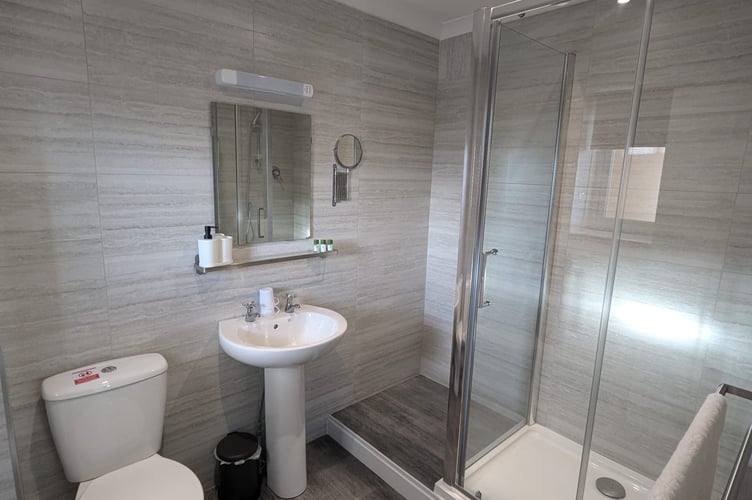 An example of one of the ensuite shower rooms in a modern boutique hotel style; all the plumbing was upgraded during the revamp of the hotel. (Picture: Fieldhead Hotel)