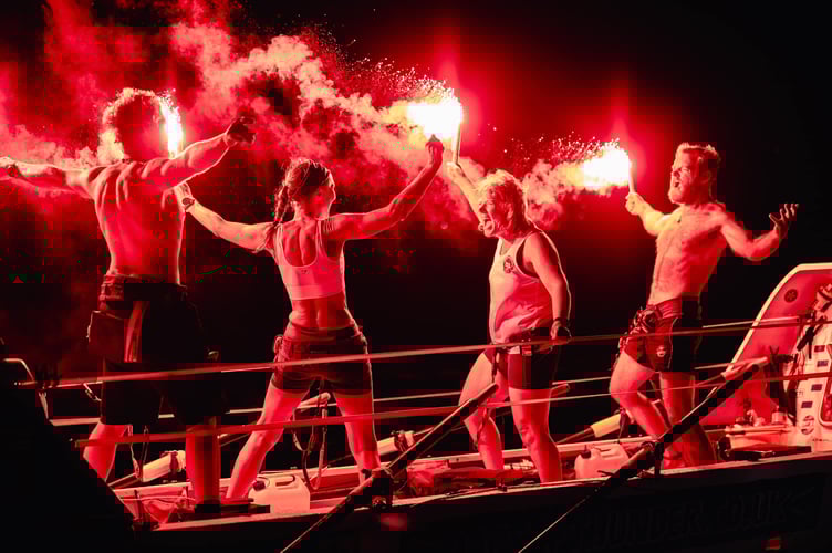 Flares light up the sky as Looe team Oars of Thunder celebrate crossing the finish line after rowing across the Atlantic. (Picture: World's Toughest Row)