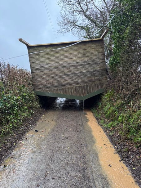 A field shelter for horses at Landulph was picked up by storm force winds over the weekend ending up blocking Church Lane near Cargreen. (Picture: Mike Bush)