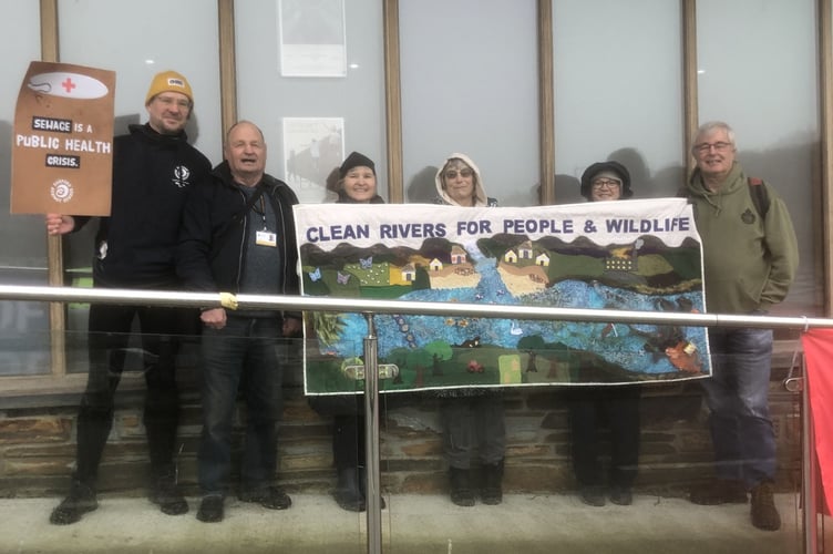 Looe Cornwall cllrs Armand Toms and Jim Candy meet with protesters ahead of the SWW community roadshow at the Millpool. (Picture: Jim Candy)