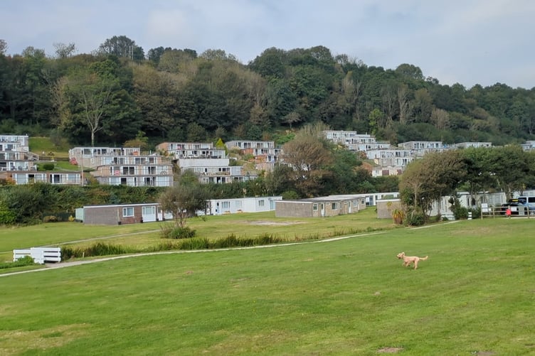EXISTING chalets on the hillside and valley floor at Millendreath Beach