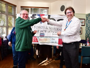Torpoint Veterans hand over cheque to Plymouth Hospital charity