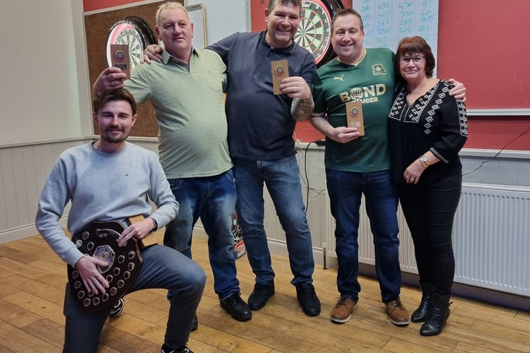 The winners and runners-up in the annual Ian Chudleigh Memorial Dart Shield which was held at Pelynt Social Club