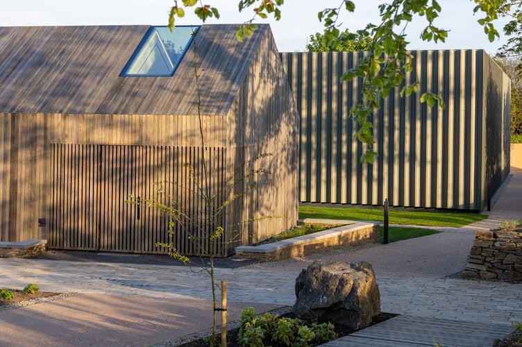 The modern visitor amenities at The story of Emily at St Ive are in stark contrast to the zinc-clad form of the immersive exhibition. (Picture: The story of Emily)