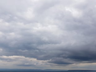 Cloudy skies today with sunshine tomorrow