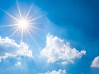 Sunny and mild with a small chance of rain today and tomorrow
