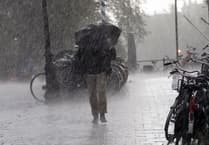 Showers persist: Light drizzle today, patchy rain tomorrow