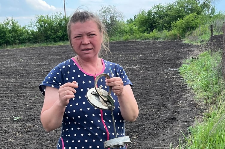 ALINA'S home village of Dovenke has been almost completely destroyed. “With her bare hands she removes mines and munitions in order to try and rebuild her life and community.”