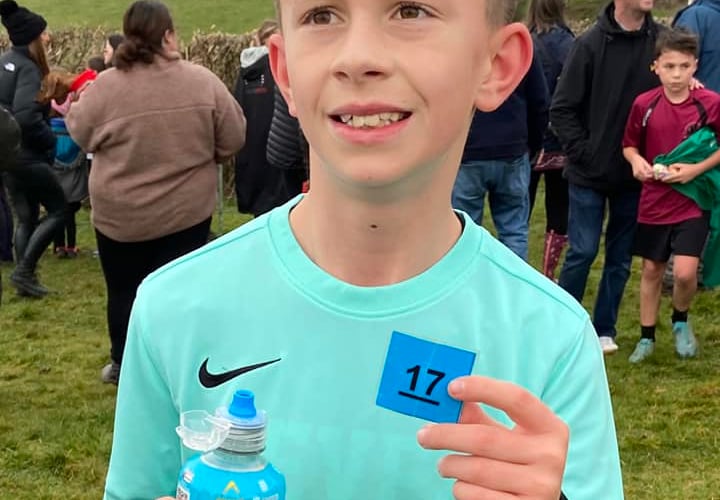 This youngster is all smiles after finishing 17th in his race
