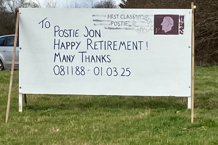 Hatt postie Jon Cook thanked by the local community for 37 years of dedicated service in this retirement banner on the local roundabout. (Picture: Jeanette Taylor)