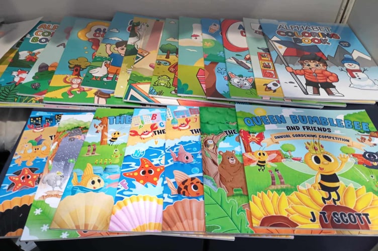 Books written by Looe-based author JT Scott are among those on display at the Philippine Book Festival 2025
