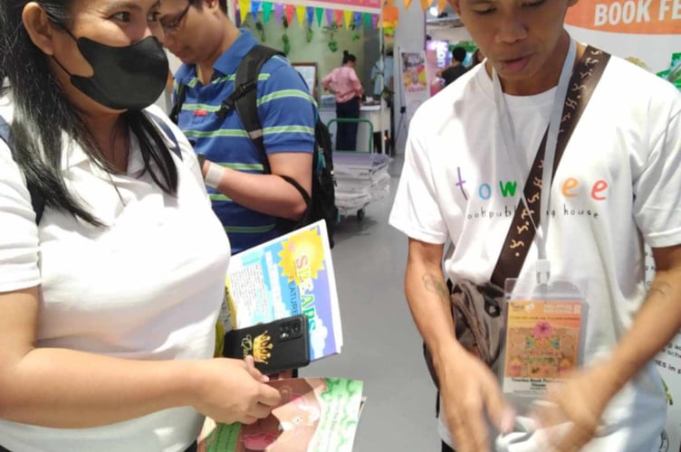 Books written by Looe-based author JT Scott are among those on display at the Philippine Book Festival 2025