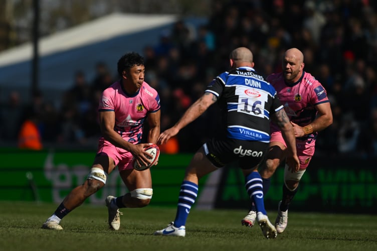 Exeter's Greg Fisilau and Jack Yeandle look to take on Bath's Tom Dunn during Sunday's Premiership Rugby Cup final at Sandy Park