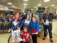 Liskeard Guides help collect vital food supplies for local charity