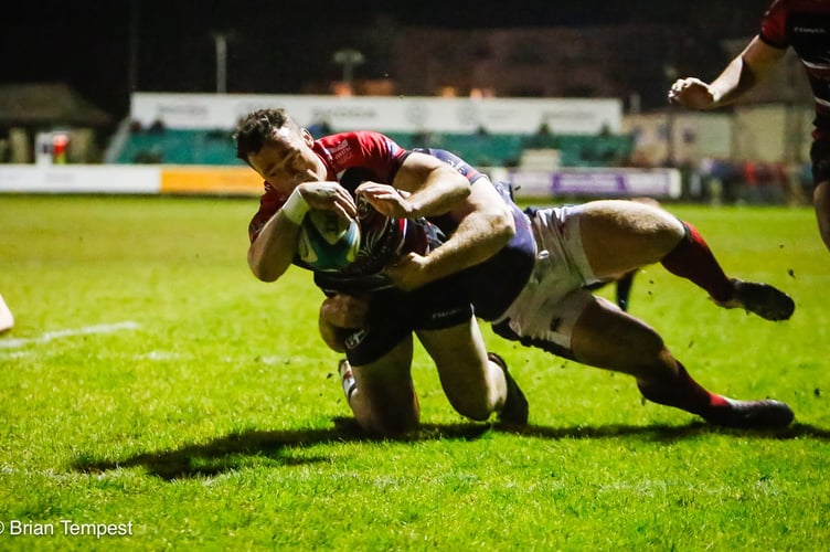 Cornish Pirates full-back Will Trewin crosses for one of his two tries against London Scottish