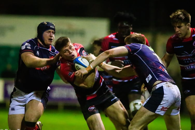 Cornish Pirates winger Matt McNab tries to find a way through the London Scottish defence